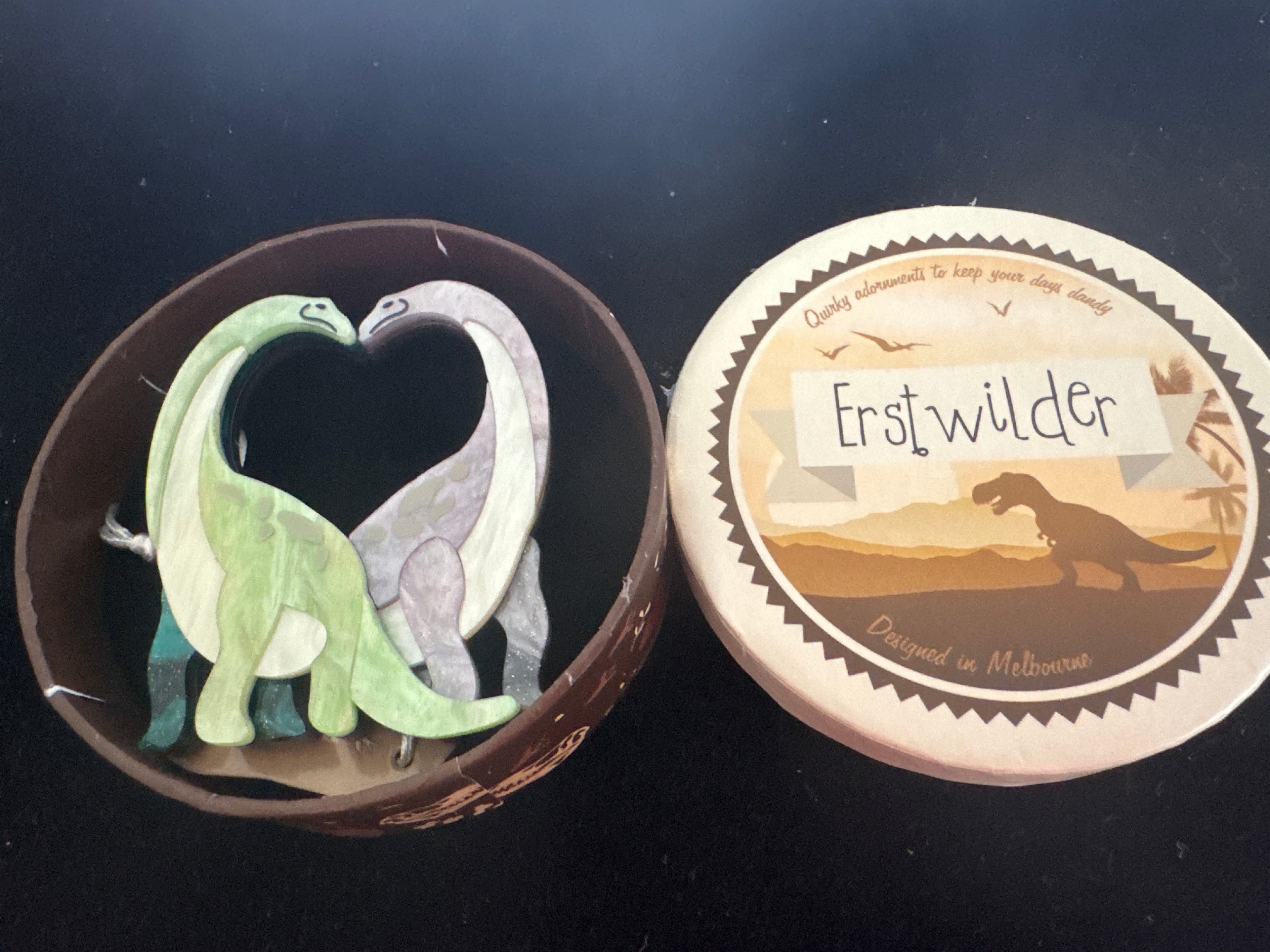ERSTWILDER DINOSAUR-NECK AND NECK-RESIN BROOCH