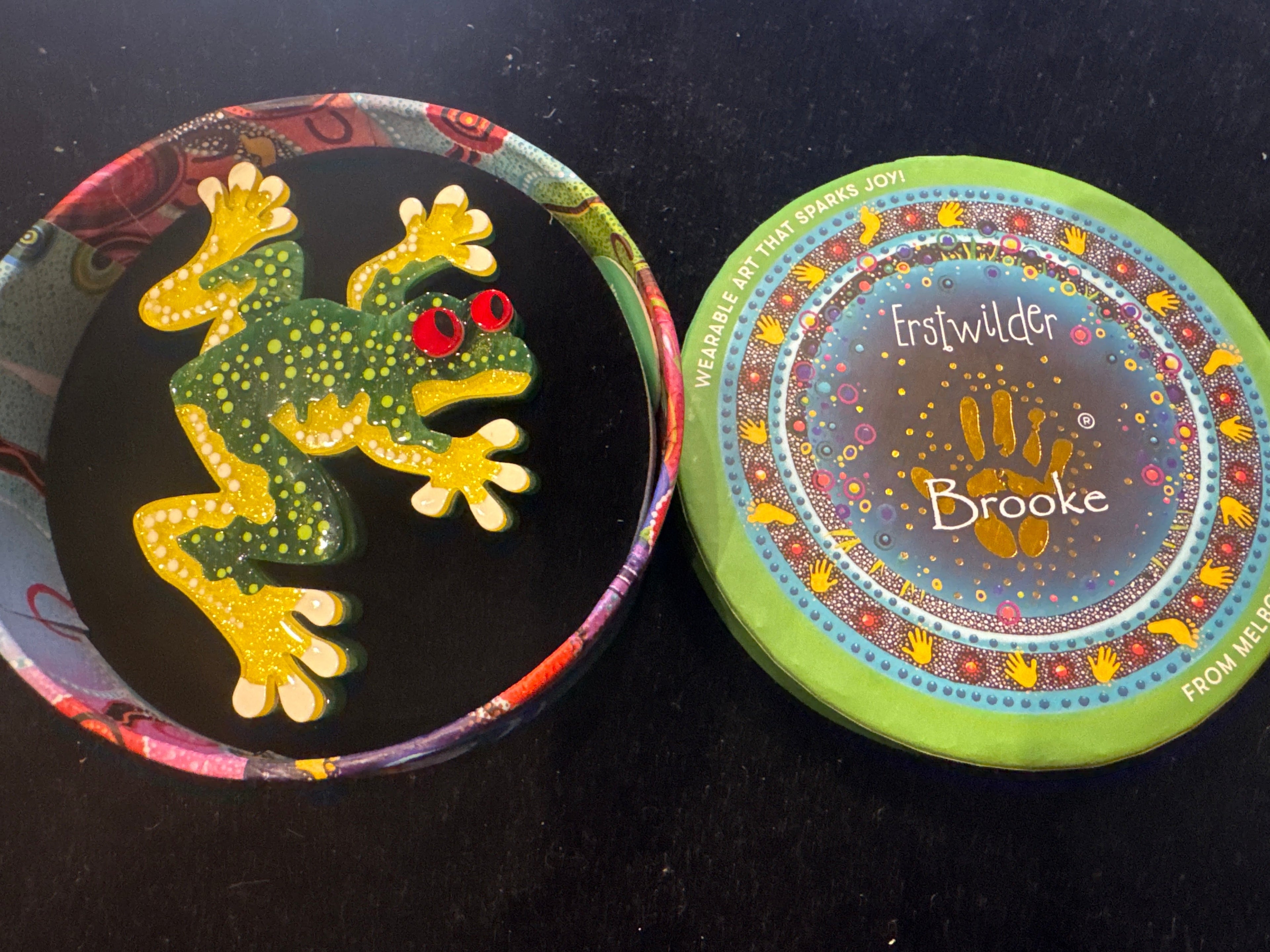 ERSTWILDER BROOKE SUTTON- TJAWAN RITJINGUTTHINPA FROG DREAMING- RESIN BROOCH