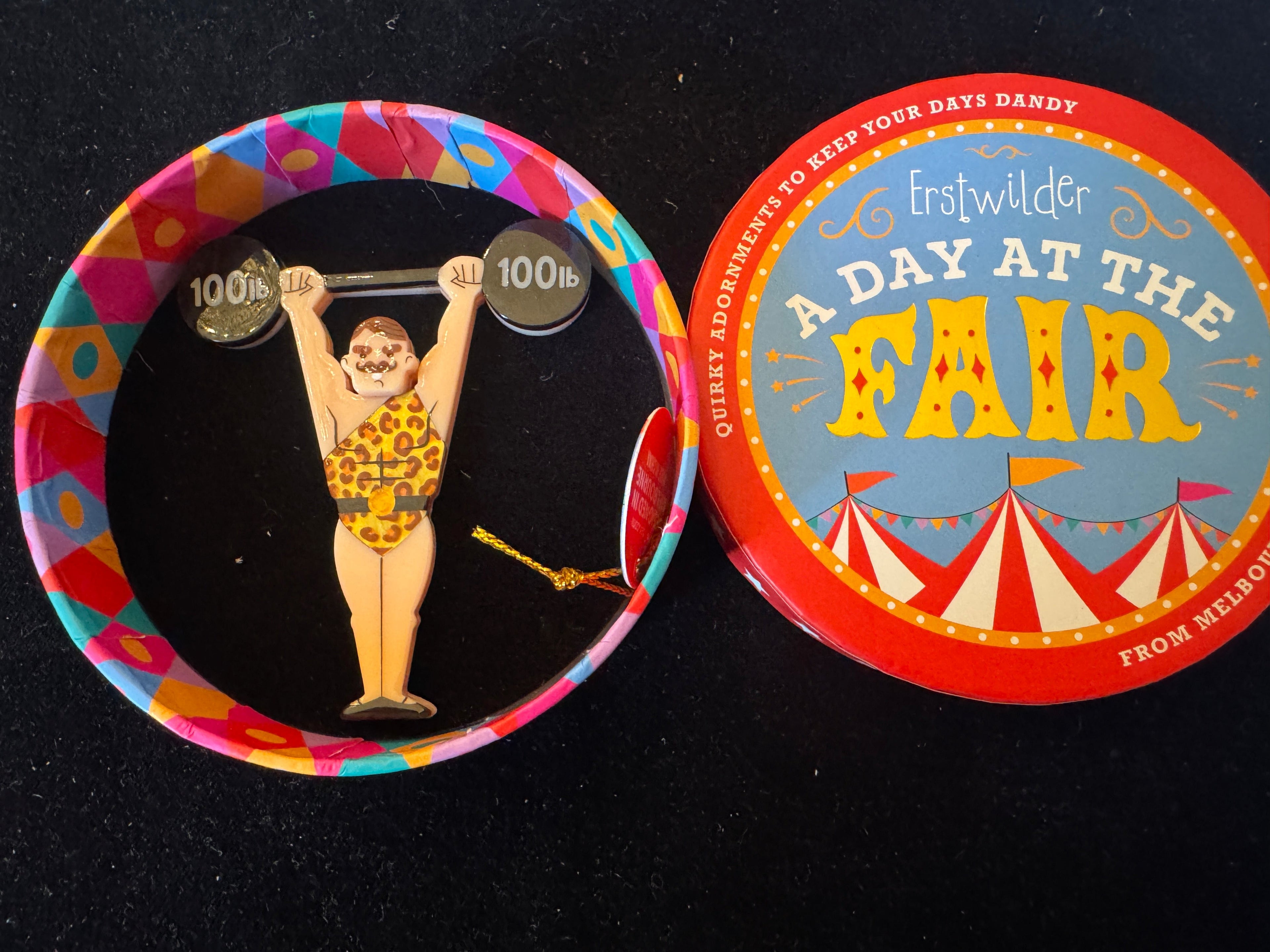 ERSTWILDER A DAY AT THE FAIR WORLD'S STONGEST MAN -Resin Brooch